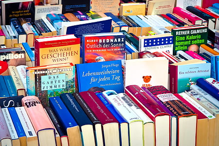 closeup photography of assorted-title book lot thumbnail