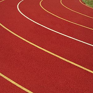 photography of race track field thumbnail