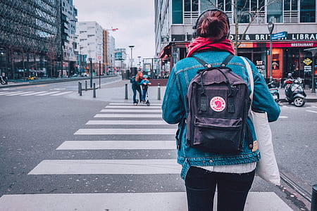 woman walking on pedestrian lane thumbnail