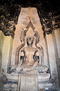 Buddha Statue in Crumbling Ruins thumbnail