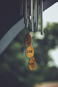 silver and brown wind chime thumbnail