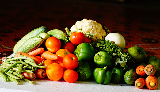 several bunch of vegetables on brown surface thumbnail