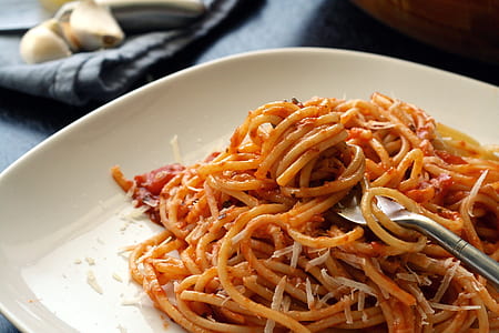 cooked pasta with tomato sauce on plate thumbnail