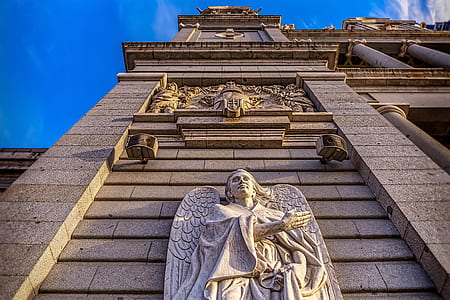 low-angle photography of building's facade thumbnail