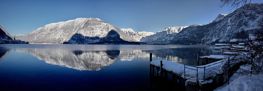 landscape photography of lake near mountain thumbnail