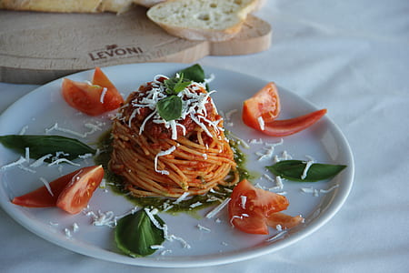 pasta with tomato sauce placed on plate thumbnail