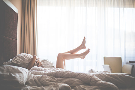 Beautiful Woman Enjoying Morning Relax in Bed thumbnail