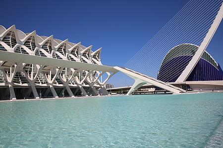 architectural photography of building near body of water thumbnail