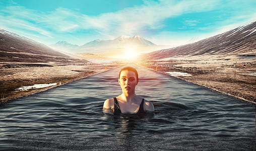 woman swimming on calm body of water thumbnail