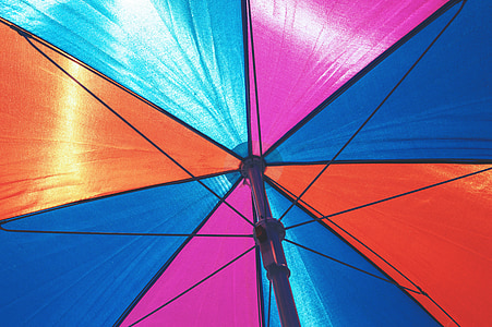 low angle photography of multicolored umbrella thumbnail