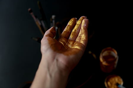 person showing left hand thumbnail