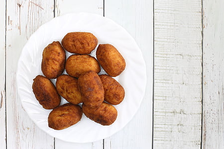 fried pastries on white plate thumbnail
