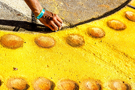 person holding chalk drawing on floor thumbnail