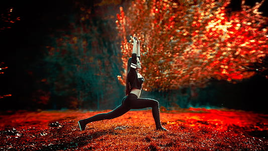 Woman Doing Yoga Near Tree thumbnail