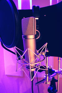 closeup photo of silver condenser microphone with pop filter thumbnail