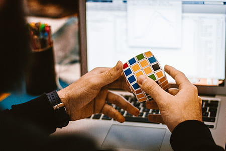 4x4 Rubik's Cube on a Man's Hand thumbnail