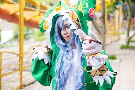Woman Wearing Green Character Costume thumbnail