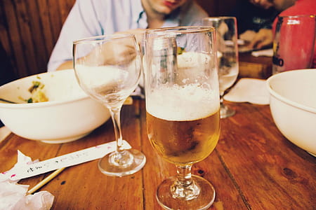 clear footed glasses on table thumbnail