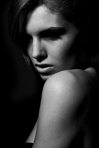grayscale photo of woman wearing brassiere thumbnail