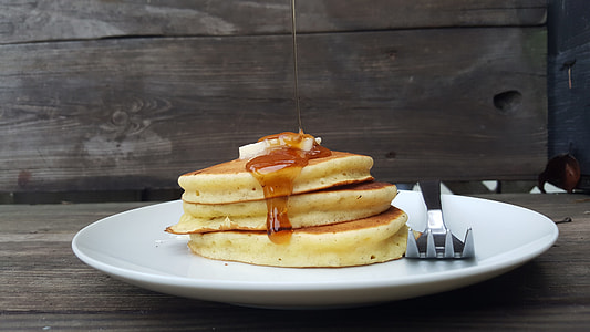 three slices of pancakes with syrup thumbnail