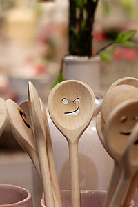 close-up photo of brown wooden ladles thumbnail