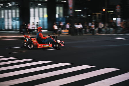 man wearing Super Mario costume and riding go-kart thumbnail