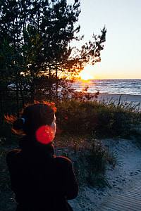 Girl watching the sunset thumbnail
