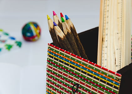 six assorted-color pencils in brown basket thumbnail