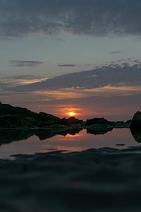 silhouette of mountains during sunset thumbnail