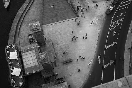 grayscale photo of people walking near building thumbnail