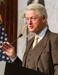 man speaking in front of podium with microphone thumbnail