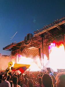 group of people in front of stage thumbnail
