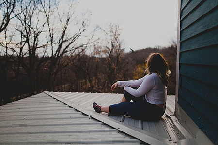 Photo of woman wearing white long sleeve sweater thumbnail