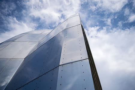 worm's eye view photography of gray high-rise building thumbnail