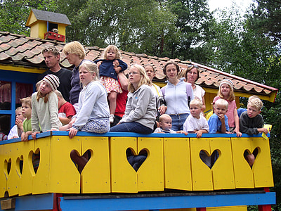 group of people on blue trailer thumbnail