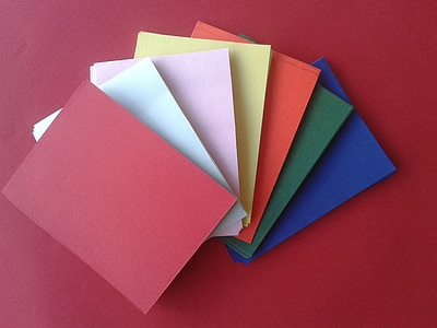 pile of assorted-color books thumbnail