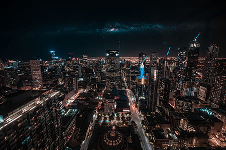 aerial photography of city buildings during night thumbnail