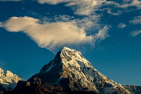 brown and white mountain under blue sky thumbnail