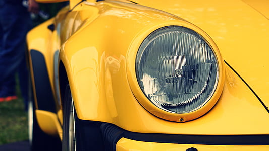 close-up photo of yellow vehicle headlight thumbnail