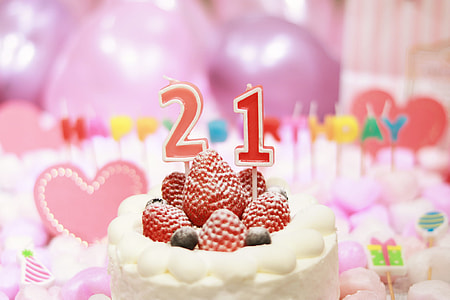 strawberry cake with #21 candle thumbnail