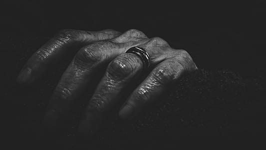 Close-Up Photography of a Hand With Ring thumbnail