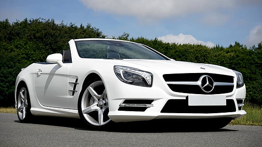 white Mercedes-Benz convertible coupe on road at daytime thumbnail