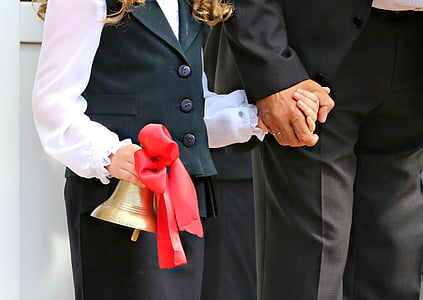 person wearing white and black suit thumbnail