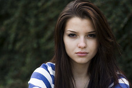 woman in blue and white striped shirt thumbnail
