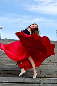 woman standing on gray stair thumbnail