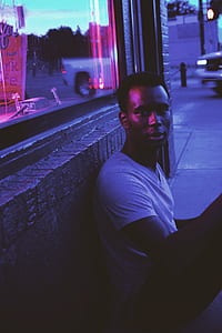 man wearing white crew-neck shirt thumbnail