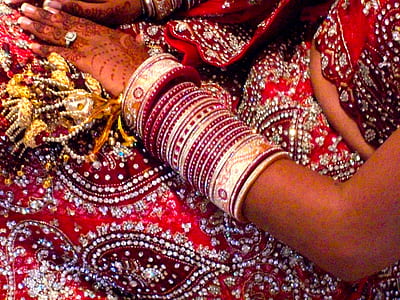 gold-and-red bracelets thumbnail
