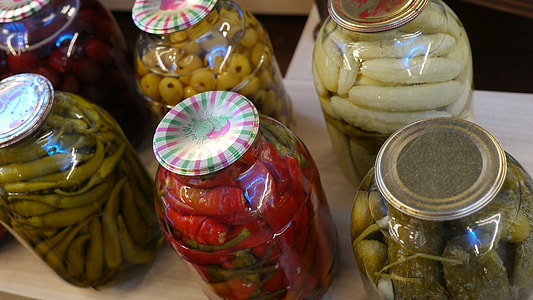 six assorted glass jars on table thumbnail