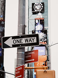 one way road signage at daytime thumbnail