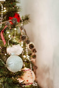 gray baubles on Christmas tree in close-up photography thumbnail